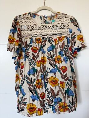 Daniel Rainn Cream Floral Blouse with Blue, Yellow & Red Blooms